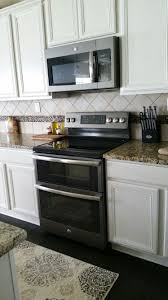 Ge Slate Appliances With Antique White Cabinets White Kitchen Appliances Slate Appliances Kitchen Slate Appliances White Cabinets