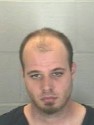 Father charged in house fire that killed twins