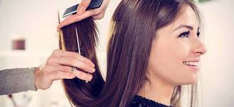 Stylist infuses hair with moisture before trimming and styling hair, adding partial or full highlights upon request. Home Adagio Salon