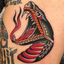 Snake tattoos represent potency and power. 50 Traditional Snake Tattoo Designs