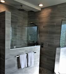 Three rectangular walls and a door are of clear tempered glass. Walk In Shower With Half Wall And Glass Partitions Traditional Bathroom Kansas City By Gercken Construction Services Houzz