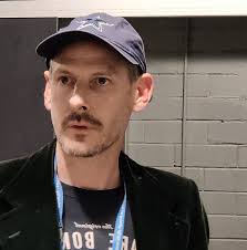 Why does my Klima scooter's throttle momentarily activate the electronic  brake when accelerating after coasting?