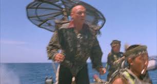 In this futuristic thriller, earth is covered with water and the human race struggles to survive on dilapidated boats and makeshift floating cities. Gif Dennis Hopper Waterworld Kino Animated Gif On Gifer By Gavinramand