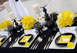 Along with the black, white, and purple napkins, this look will be a hit at your next function. Isari Flower Studio Event Design Yellow Wedding Table Decorations Event Decor