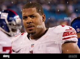 New York Giants tackle Sean Donnelly (71), offensive tackle Ereck Flowers  (76) and defensive tackle Carlif Taylor (63) before an NFL preseason  football game against the Cincinnati Bengals in Cincinnati, Friday, Aug.