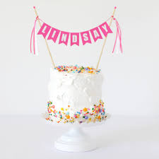 See more ideas about easy cake decorating, birthday cake decorating, easy cake. How To Dress Up Simple Birthday Cakes With Paper Bunting Cake Toppers