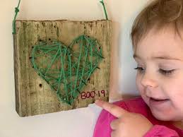 Using wood, nails, a hammer, and a heck of a lot of string; Nail And String Art Heart Activity Family Days Tried And Tested