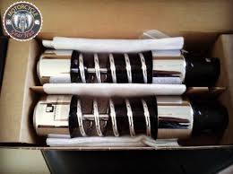 Maybe you would like to learn more about one of these? A Photograph Showing The Chrome Heavy Duty Progressive 412 Shocks To Install On A Slammed Harley Davidson Road King Motorcycle For A Lowrider Chicano Style Motorcycle Gear Hub