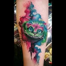 Tim Burton S Alice In Wonderland Cheshire Cat Watercolor Tattoo By Jj At B Z Ink Tattoo Shop In Macomb Michigan Tattoos Tim Burton Tattoo Ink Tattoo