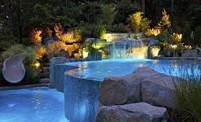 Your backyard pool will bring back memories of pool parties past, with the endless pools difference: 15 Pool Waterfalls Ideas For Your Outdoor Space Home Design Lover