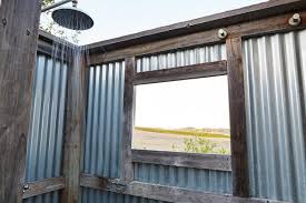 Outdoor showers are extremely functional elements, that turn out especially useful in gardens. Outdoor Shower With View Of Napa Valley In Cabin By Trinette Reed