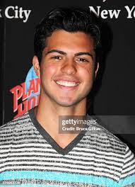 Dax Roy poses at the "Tio Papi" Photo Call at Planet Hollywood Times...  News Photo