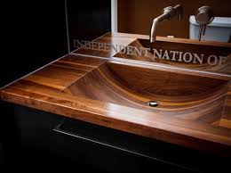 Wood in bathrooms is an option, find out to safely feature epic wooden floors, wooden countertops, reclaimed wood vanity, wooden sinks and tubs and even hardwood floors, wooden walls in the bathroom and even vanity pieces will require express maintenance and possibly a yearly application. Wood Vanity With All Types Of Sinks