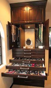 Choose a portable hamper with handles drawer organizers are another jewelry storage idea if you feel more comfortable keeping items out of sight. Custom Jewelry Storage By Closet Trends Wall Closet Closet Design Master Bedroom Closet