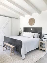 Metal Bed Bedroom Metal Bed Natural Rug Concrete Flooring Wall Paint Color Is Benjamin Moore Whi Concrete Bedroom Master Bedroom Inspiration Floor Rugs Bedroom