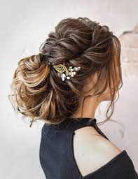 These back twisted piggy buns are so cute and are perfect for younger girls. 50 Stunning Bun Hairstyles You Need To Check Out Now