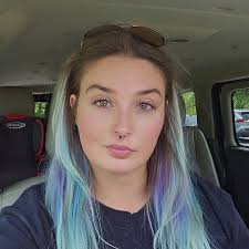 What is causing grapes to turn black and leaves to look rusty?