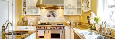 Here, you can see a bright yellow wall is paired with dark cherry cabinets. Kitchen Paint Colors With Dark Cabinets Overland Park