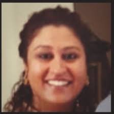 Olivia Sylvester, Senior Math Major, enjoying the blue sky day.