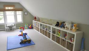 How To Make An Attic Into A Bedroom Hidden Door Storage How To Decorate Rooms With Slanted Ceiling Attic Storage Solutions Playroom Storage Playroom Furniture