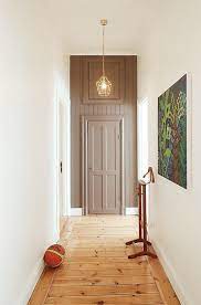 A Long Narrow Hallway Help For A Dark Scary Mess Hallway Flooring Narrow Hallway Cottage Hallway