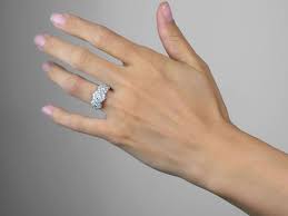 Diamond cluster statement ring (1 ct. 18ct White Gold Triple Cluster Diamond Ring The Antique Jewellery Company