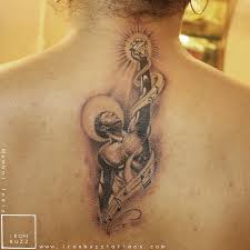 The washington post getty images. All Sizes Angel Music Notes Rock Love Memorial Tattoo Dad On Nape Back Black And Gray Color Tattoo Best Design For Men And Women By Artist Eric Dsouza At Iron Buzz Tattoos And Piercing Versova Andheri Mumbai India Flickr Photo Sharing