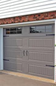 A garage door can make up a large portion of your home's exterior design. Garage Door Charleston West Virginia Tnt Garage Doors Inc