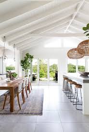 The Kitchen And Dining Space Here At The Grove Byron Bay Is Enjoyed By Family And Friends With Raked Ceilings And Never E House Inspiration House Design Home