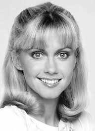 Olivia Newton-John's iconic hairstyle in 1978