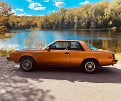 Image result for Spitfire Orange 1980 Challenger