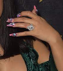 Cardi B S Huge Pear Shaped Rock Is Said To Be Worth At Least Half A Million Dollars Cardi B Nails Celebrity Wedding Rings Nail Jewels