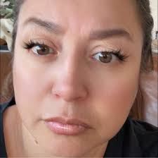 Beautiful coffee table with 4 drawers for storage has a very nice finish  that is easy to wipe off