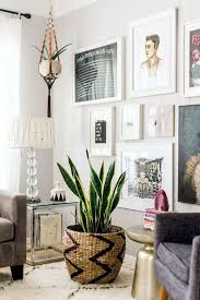 Photo of an eclectic formal living room in london with white walls, light hardwood flooring and beige floors. 6 Creative Ways To Include Indoor Plants Into Your Home Decor