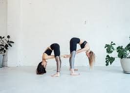 How it strengthens your relationship: 6 Partner Yoga Moves Anyone Can Do Om The City