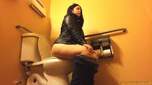 The Queen of Copro covering in filth