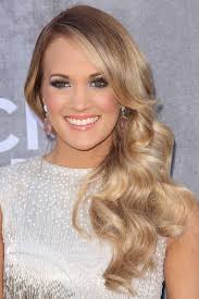 Carrie underwood's long, blonde, romantic, curly hairstyle makes an otherwise casual outfit look stunning with soft, subtle curls. Carrie Underwood S Hairstyles Hair Colors Steal Her Style