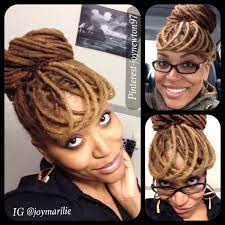 Medium length and long locs can be pulled up into a man bun, ponytail or half up style. Pin On Beauty