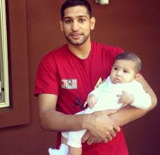 Amir Khan And His Baby Lamaisah Combat Sport Mma Sports Equipment