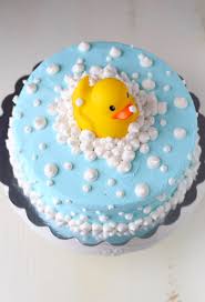 Perfect for a baby shower brunch, these mini donuts are a sweet and light treat that would look lovely layered up on a cake stand. Rubber Ducky Baby Shower Cake Mom Loves Baking