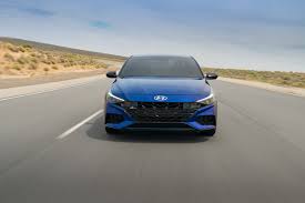 It casts a longer shadow compared to the outgoing sedan, it travels longer on a tank of fuel, it has a longer infotainment screen, and comes with a longer list of options. 2021 Hyundai Elantra N Line Balances Performance And Value
