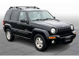 Image result for Brilliant Black 2002 Jeep