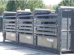 Priefert Bucking Chutes - Grey Cattle Barn Horse Barns Bull Riding