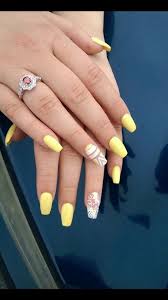 Using these colors will give a stunning look to your nails. Pastel Yellow Medium Length Coffin Acrylic Nails Novocom Top