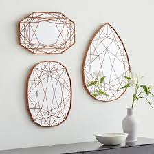 Watch this diy on how to make this super cool mirrored geometric mosaic wall art! Geo Shape Mirror Wall Art