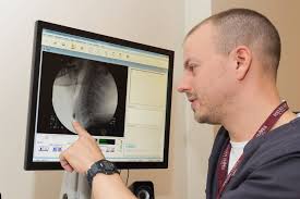 Meet Karl Holmstrom, SLP, one of our amazing Speech Language Pathologists.  Karl primarily treats inpatients who have suffered traumatic brain  injuries, but also sees patients who are recovering from spinal cord  injuries,