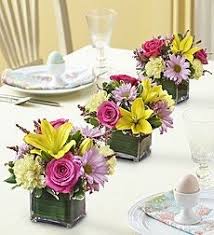 Can You Grow Your Easter Lily Outdoors Easter Flower Arrangements Easter Flowers Table Flower Arrangements