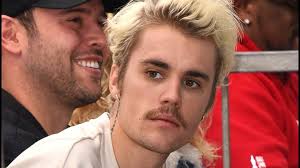 TimBiebs doughnut boxes, merchandise being resold online for high prices