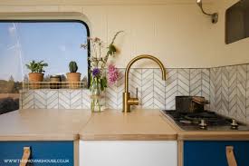 kitchen with belfast sink cover in
