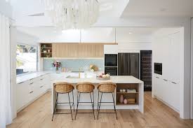 Here we see a simple l shaped kitchen design with crisp white and grey cabinets that adds to allocate space to create an island that can help with food preparation. L Shaped Kitchen Layout Design Ideas Freedom Kitchens